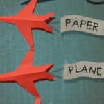 A book cover with 4 red paper planes in a chain, a pair of scissors in the top corner are about to cut the chain and the text paper plain chains floats behind in capital letters